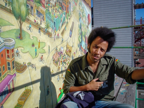 Boots Riley of The Coup visiting the mural